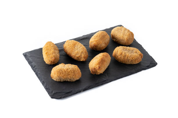 Croquetas de Secreto de cerdo y miel Meson