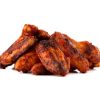 Fried wings close-up. Buffalo wings isolated on white.