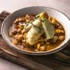 Potaje de vigilia - Chickpea stew with spinach and cod. Typical spanish food for Easter holidays. Chickpea stew with spinach